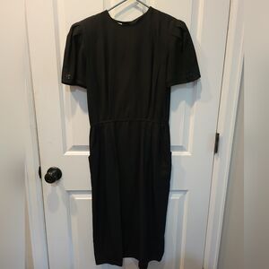 100% Silk, vintage black dress, size 8. Simple dress, no designer, great price